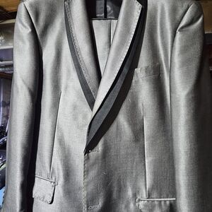Sophisticated Silver Suit Black Lapel.